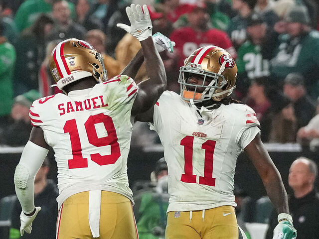 PHILADELPHIA, PENNSYLVANIA - DECEMBER 03: Deebo Samuel #19 of the San Francisco 49ers celebrates after a touchdown with Brandon Aiyuk #11 during the third quarter in the game against the Philadelphia Eagles at Lincoln Financial Field on December 03, 2023 in Philadelphia, Pennsylvania.