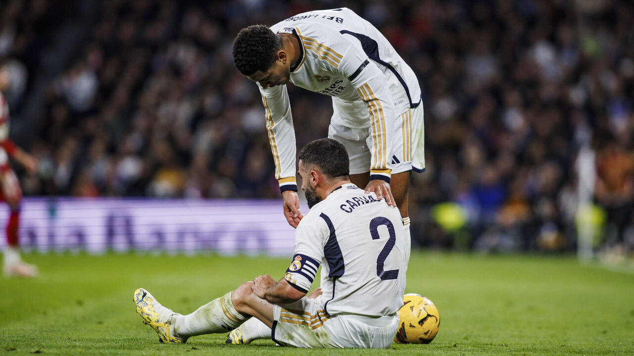 Daniel Carvajal of Real Madrid CF is talking to Jude Bellingham of Real Madrid CF during the LaLiga EA Sports match between Real Madrid CF and Granada CF at Estadio Santiago Bernabeu in Madrid, Spain, on December 2, 2023.