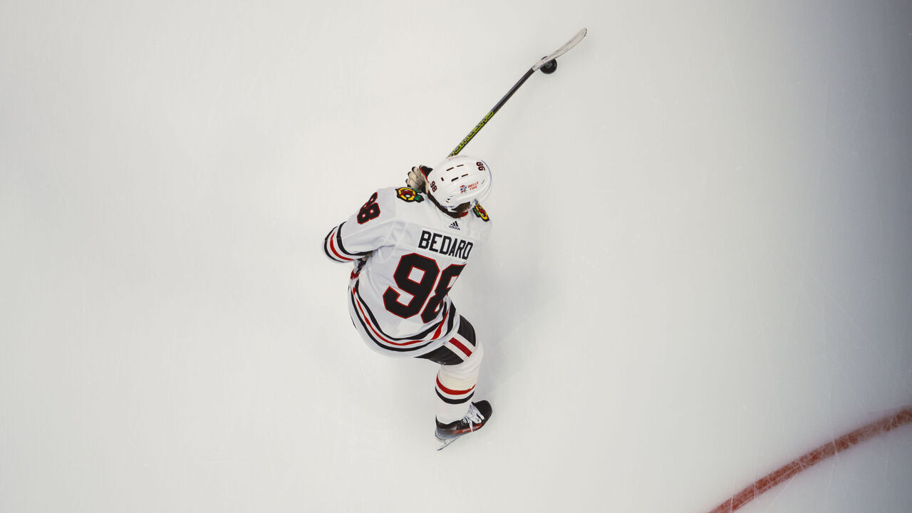 DETROIT, MI - NOVEMBER 30: Connor Bedard #98 of the Chicago Blackhawks during warmups against the Detroit Red Wings at Little Caesars Arena on November 30, 2023 in Detroit, Michigan.
