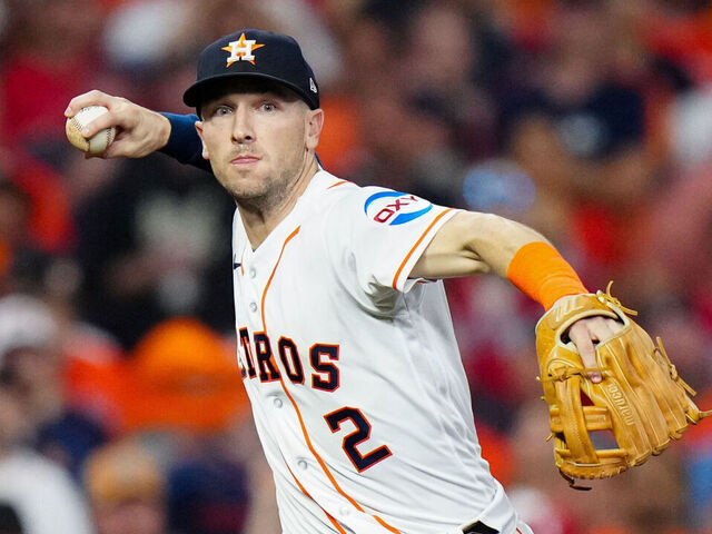 HOUSTON, TX - OCTOBER 23: Alex Bregman #2 of the Houston Astros fields a ball during Game 7 of the ALCS between the Texas Rangers and the Houston Astros at Minute Maid Park on Monday, October 23, 2023 in Houston, Texas.