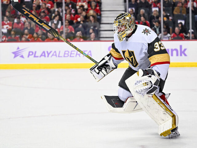 CALGARY, AB - NOVEMBER 27: Vegas Golden Knights Goalie Adin Hill (33) skates to the bench for an extra attacker during the first period of an NHL game between the Calgary Flames and the Vegas Golden Knights on November 27, 2023, at the Scotiabank Saddledome in Calgary, AB.