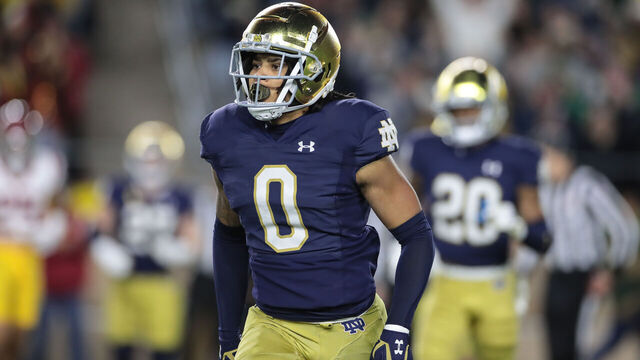 SOUTH BEND, IN - OCTOBER 14: Notre Dame Fighting Irish safety Xavier Watts (0) runs off the field after an interception during USC Trojans vs Notre Dame Fighting Irish game on October 14, 2023, at Notre Dame Stadium in South Bend, IN.