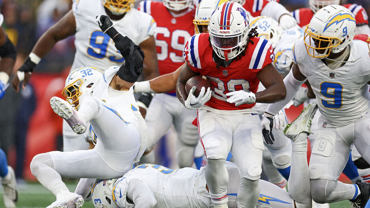 FOXBOROUGH, MASSACHUSETTS - DECEMBER 03: Rhamondre Stevenson #38 of the New England Patriots runs with the ball in the first quarter against the Los Angeles Chargers at Gillette Stadium on December 03, 2023 in Foxborough, Massachusetts.
