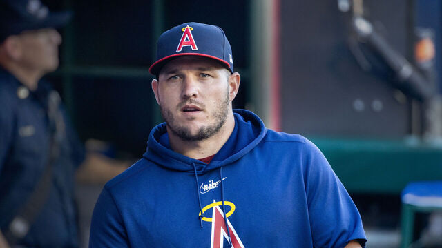 Anaheim, CA - July 21: Angels star Mike Trout walks in the dugout before a game with the Pirates at Angel Stadium in Anaheim Friday, July 21, 2023. (Allen J. Schaben / Los Angeles Times via Getty Images)