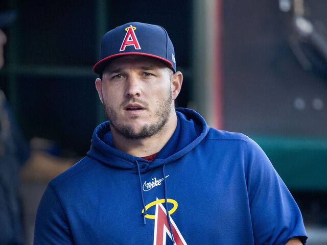 Anaheim, CA - July 21: Angels star Mike Trout walks in the dugout before a game with the Pirates at Angel Stadium in Anaheim Friday, July 21, 2023. (Allen J. Schaben / Los Angeles Times via Getty Images)