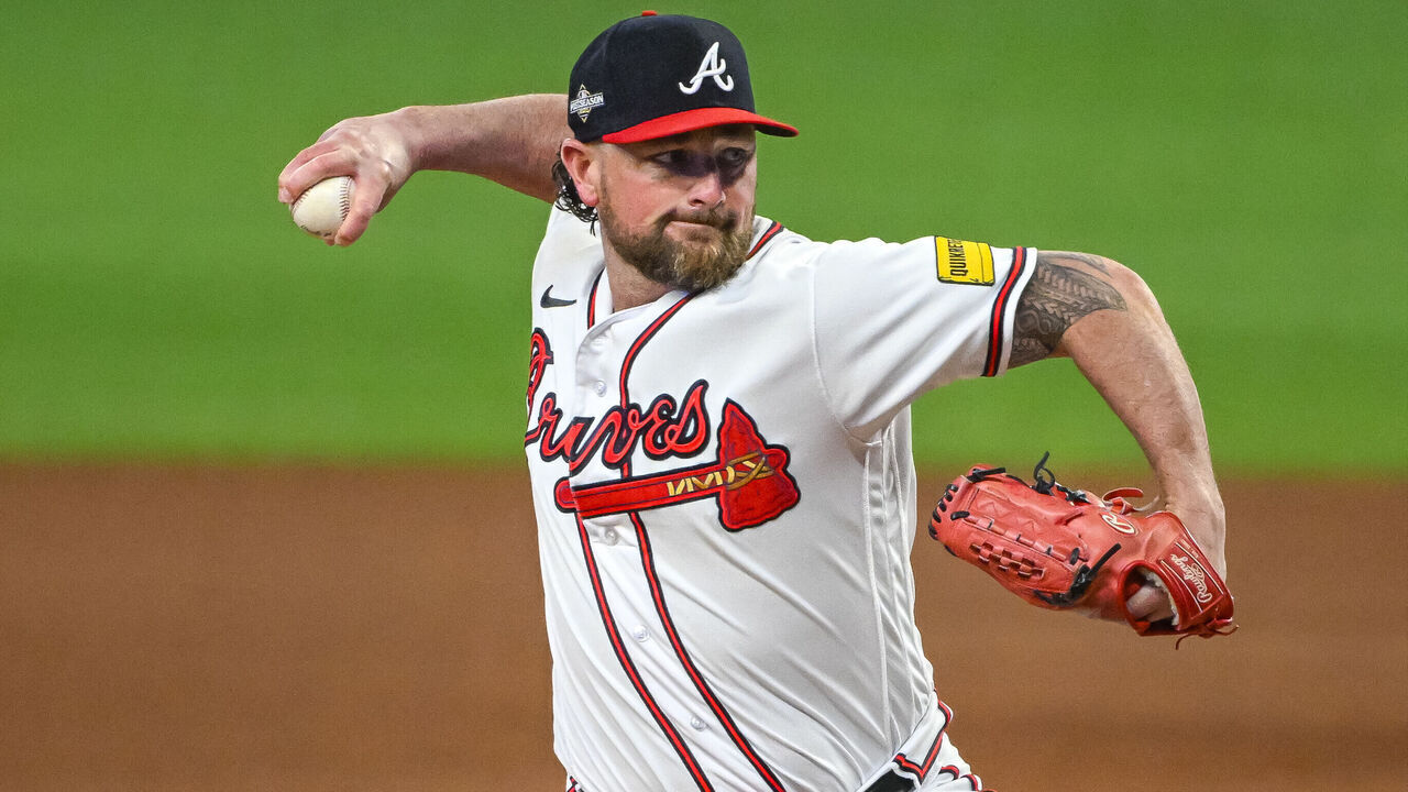ATLANTA, GA - OCTOBER 09: Atlanta Braves relief pitcher Kirby Yates (22) pitching in the sixth inning of game 2 of the NLDS between the Philadelphia Phillies and Atlanta Braves on October 9, 2023, at Truist Park in Atlanta, GA.