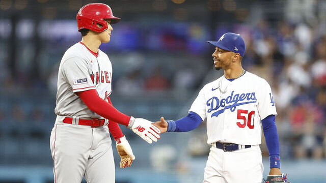 LOS ANGELES, CALIFORNIA - JULY 07: Mookie Betts #50 of the Los Angeles Dodgers and Shohei Ohtani #17 of the Los Angeles Angels in the fourth inning at Dodger Stadium on July 07, 2023 in Los Angeles, California.