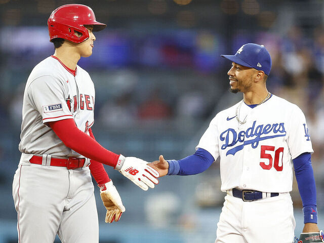 LOS ANGELES, CALIFORNIA - JULY 07: Mookie Betts #50 of the Los Angeles Dodgers and Shohei Ohtani #17 of the Los Angeles Angels in the fourth inning at Dodger Stadium on July 07, 2023 in Los Angeles, California.