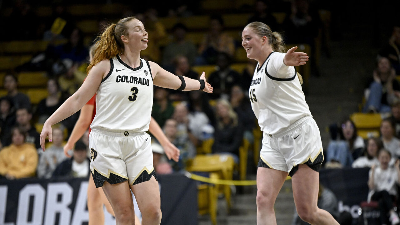 BOULDER, CO - NOVEMBER 28: Frida Formann (3) of the Colorado Buffaloes celebrates with Charlotte Whittaker (45) during the fourth quarter of CU's 85-55 win against the Boston University Terriers at the CU Events Center in Boulder on Tuesday, November 28, 2023.
