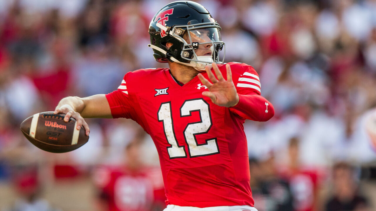 LUBBOCK, TEXAS - SEPTEMBER 16: Tyler Shough #12 of the Texas Tech Red Raiders passes the ball during the first half of the game against the Tarleton State Texans at Jones AT&T Stadium on September 16, 2023 in Lubbock, Texas.