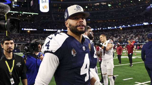 ARLINGTON, TX - NOVEMBER 23: Dak Prescott #4 of the Dallas Cowboys walks to midfield after an NFL football game against the Washington Commanders at AT&T Stadium on November 23, 2023 in Arlington, Texas.