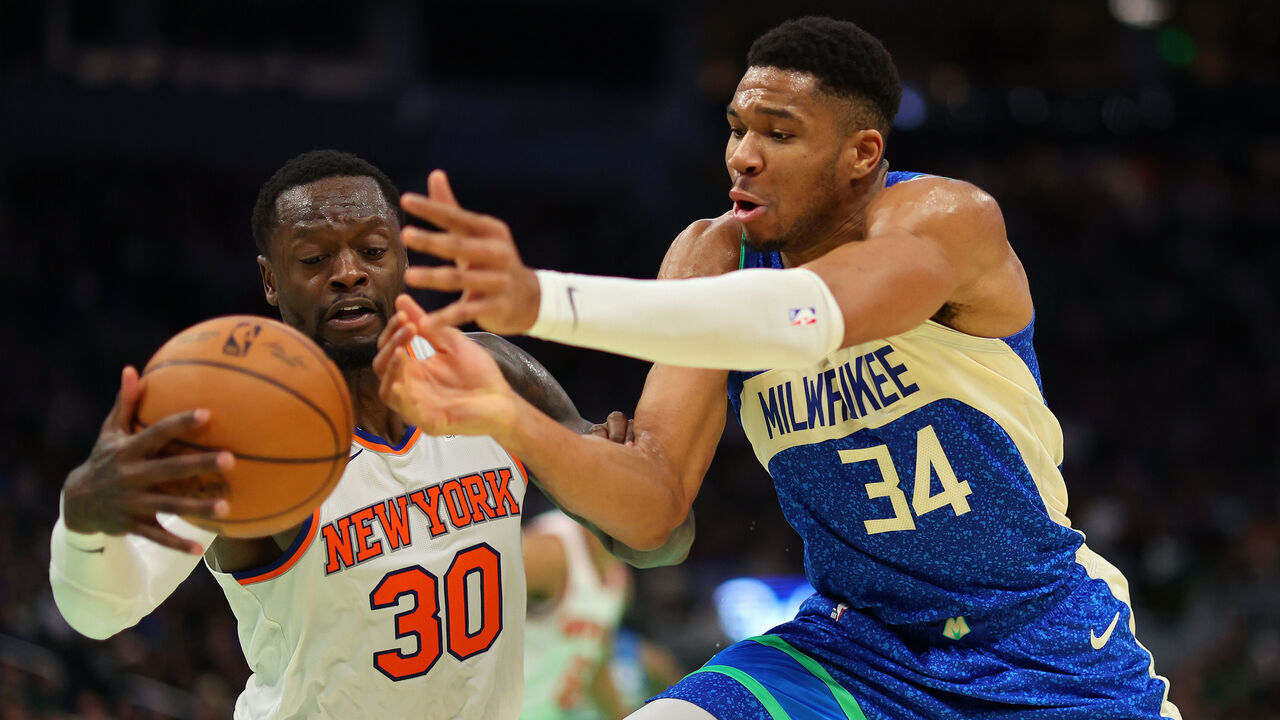 MILWAUKEE, WISCONSIN - DECEMBER 05: Giannis Antetokounmpo #34 of the Milwaukee Bucks is defended by Julius Randle #30 of the New York Knicks during the first half of the NBA In-Season Tournament Quarterfinal at Fiserv Forum on December 05, 2023 in Milwaukee, Wisconsin.