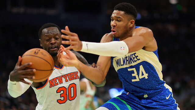 MILWAUKEE, WISCONSIN - DECEMBER 05: Giannis Antetokounmpo #34 of the Milwaukee Bucks is defended by Julius Randle #30 of the New York Knicks during the first half of the NBA In-Season Tournament Quarterfinal at Fiserv Forum on December 05, 2023 in Milwaukee, Wisconsin.