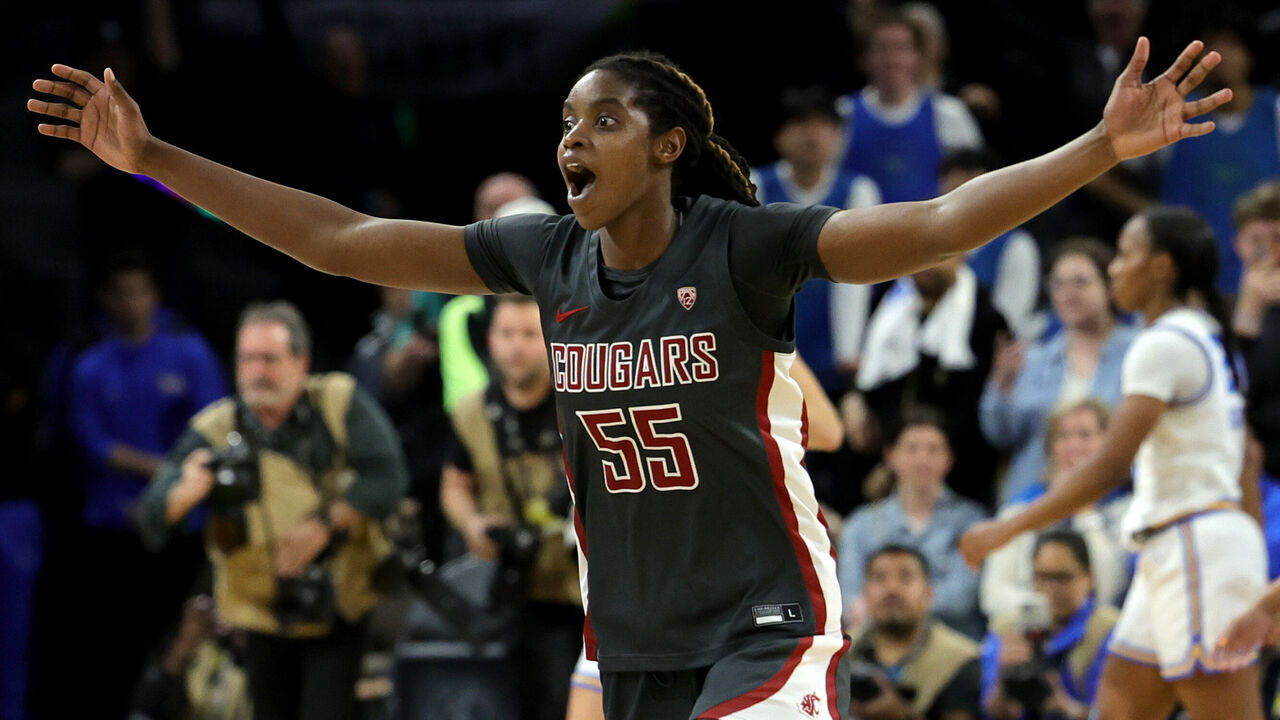 LAS VEGAS, NEVADA - MARCH 05: Bella Murekatete #55 of the Washington State Cougars runs down the court after time expired in their 65-61 victory over the UCLA Bruins to win the championship game of the Pac-12 Conference women's basketball tournament at Michelob ULTRA Arena on March 05, 2023 in Las Vegas, Nevada.