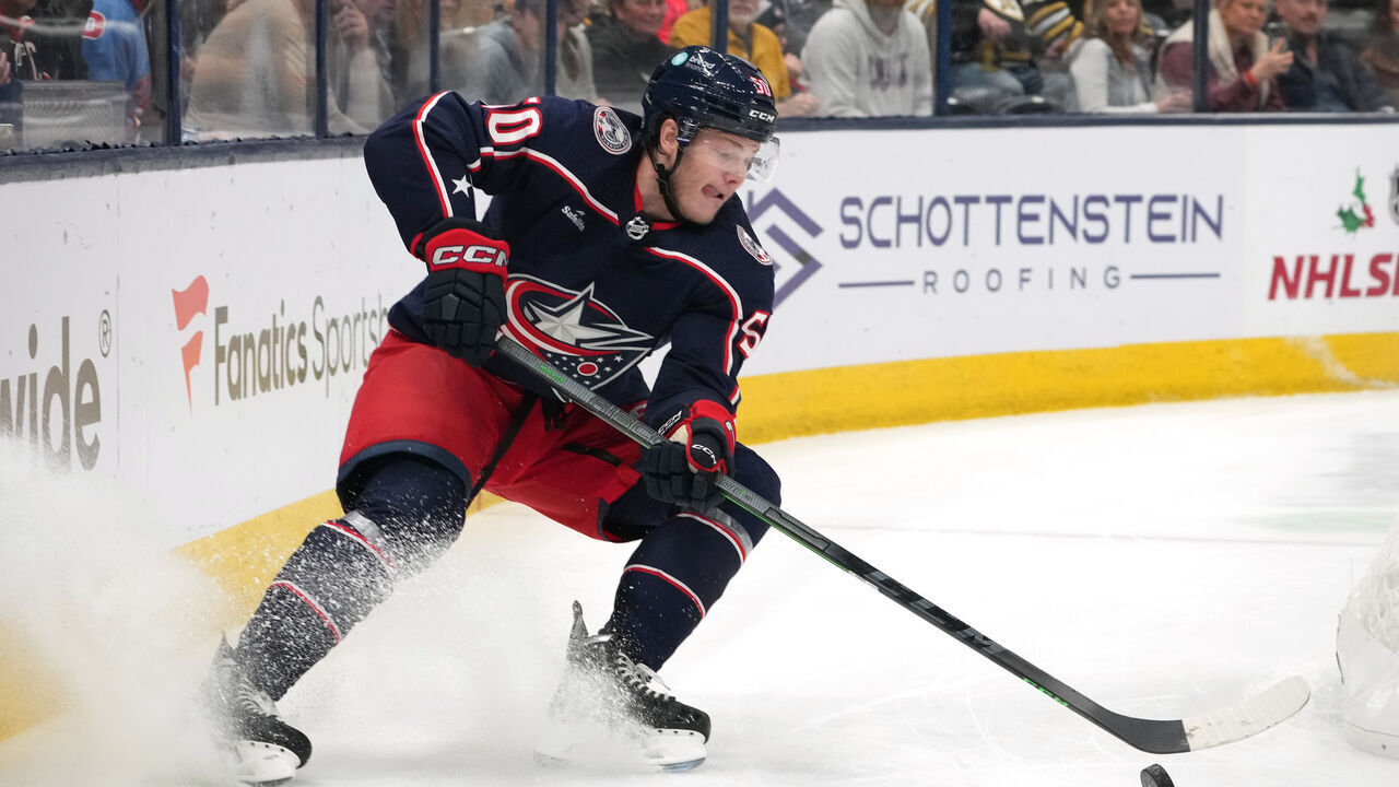 COLUMBUS, OHIO - NOVEMBER 27: Eric Robinson #50 of the Columbus Blue Jackets controls the puck during the second period against the Boston Bruins at Nationwide Arena on November 27, 2023 in Columbus, Ohio.