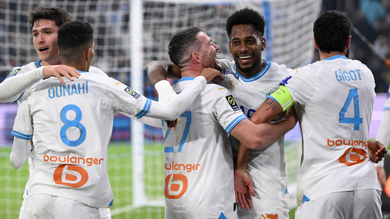 Marseille's French midfielder #27 Jordan Veretout (C) and Marseille's French defender #04 Samuel Gigot (R) celebrate with Marseille's Panamanian defender #62 Michael Murillo (2R) after he scored Marseille's second goal during the French L1 football match between Olympique Marseille (OM) and Olympique Lyonnais (Lyon) at the Stade Velodrome in Marseille, southern France on December 6, 2023.