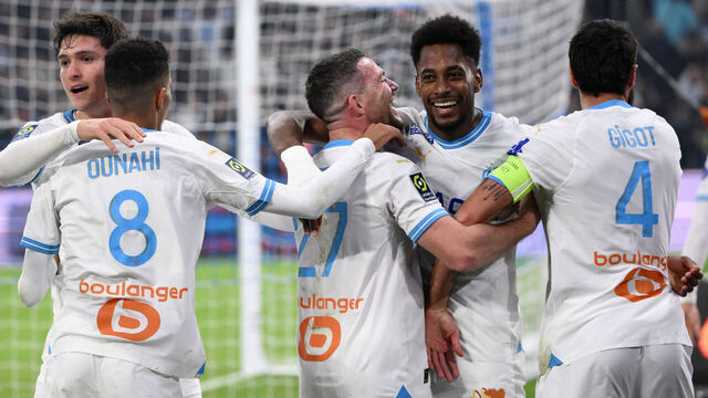 Marseille's French midfielder #27 Jordan Veretout (C) and Marseille's French defender #04 Samuel Gigot (R) celebrate with Marseille's Panamanian defender #62 Michael Murillo (2R) after he scored Marseille's second goal during the French L1 football match between Olympique Marseille (OM) and Olympique Lyonnais (Lyon) at the Stade Velodrome in Marseille, southern France on December 6, 2023.