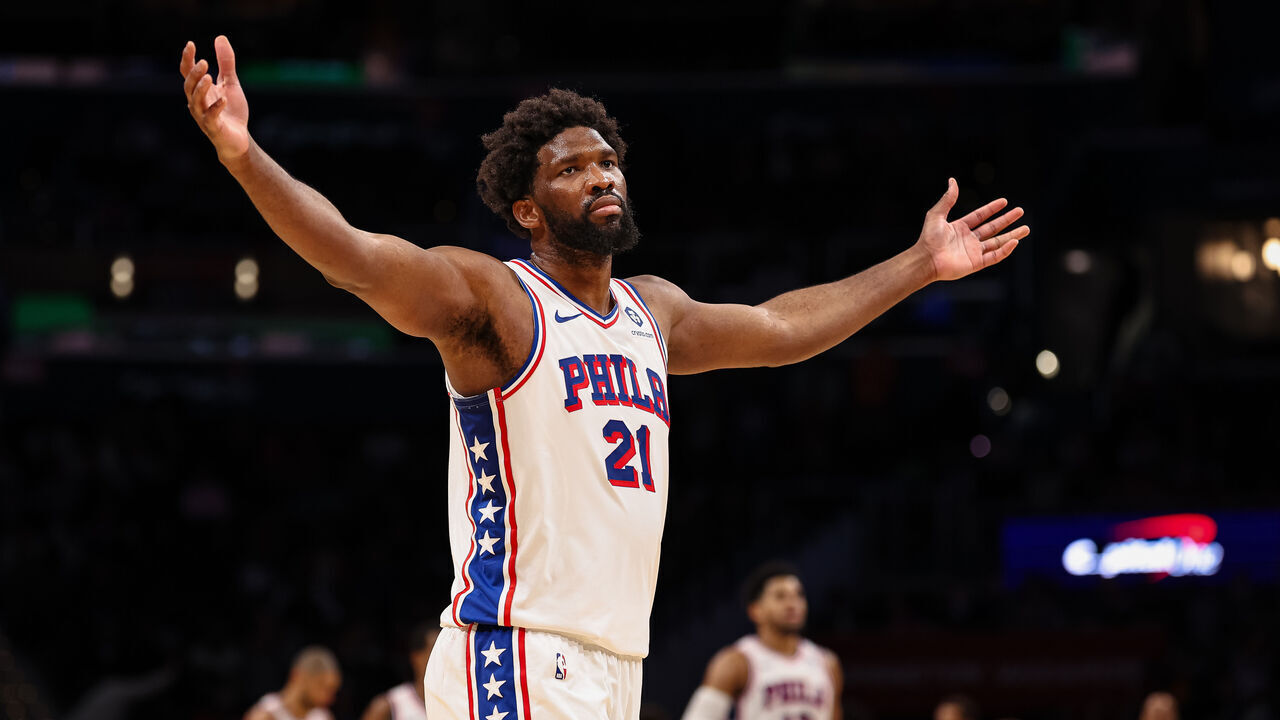 WASHINGTON, DC - DECEMBER 06: Joel Embiid #21 of the Philadelphia 76ers reacts after scoring 50 points against the Washington Wizards during the second half at Capital One Arena on December 06, 2023 in Washington, DC.
