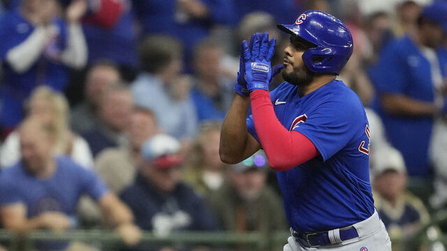 MILWAUKEE, WISCONSIN - SEPTEMBER 29: Jeimer Candelario #9 of the Chicago Cubs celebrates after hitting a solo home run against the Milwaukee Brewers in the eighth inning at American Family Field on September 29, 2023 in Milwaukee, Wisconsin.