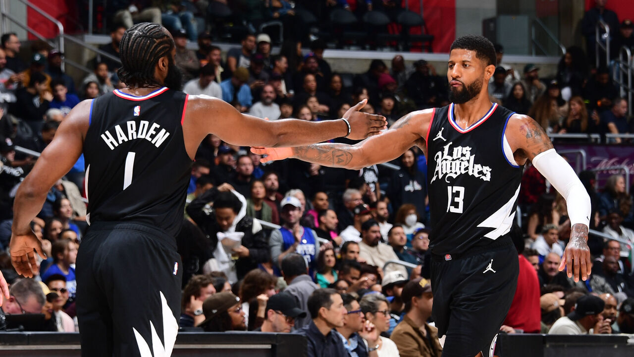 LOS ANGELES, CA - DECEMBER 6: James Harden #1 of the LA Clippers & Paul George #13 of the LA Clippers high five during the game on December 6, 2023 at Crypto.Com Arena in Los Angeles, California. NOTE TO USER: User expressly acknowledges and agrees that, by downloading and/or using this Photograph, user is consenting to the terms and conditions of the Getty Images License Agreement. Mandatory Copyright Notice: Copyright 2023 NBAE