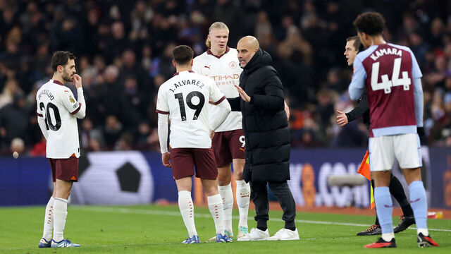 BIRMINGHAM, ENGLAND - DECEMBER 06: Pep Guardiola, Manager of Manchester City, speaks with Julian Alvarez of Manchester City during the Premier League match between Aston Villa and Manchester City at Villa Park on December 06, 2023 in Birmingham, England.