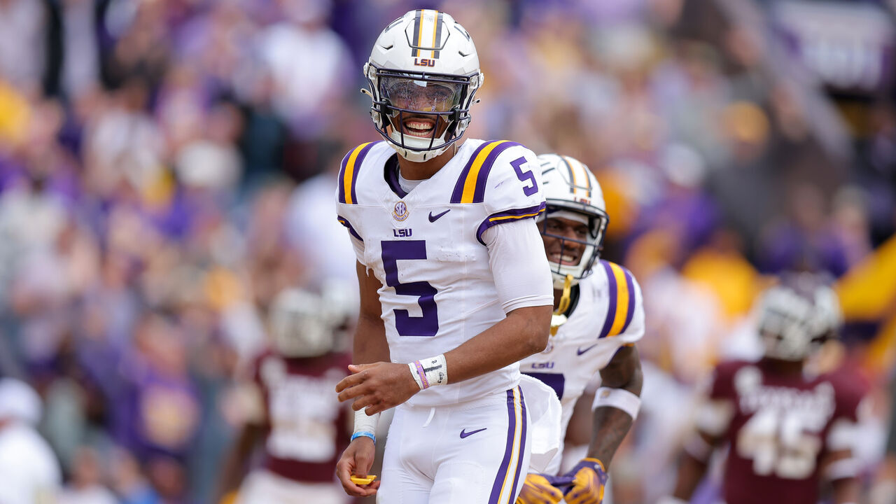 BATON ROUGE, LOUISIANA - NOVEMBER 25: Jayden Daniels #5 of the LSU Tigers celebrates a touchdown during a game against the Texas A&M Aggies at Tiger Stadium on November 25, 2023 in Baton Rouge, Louisiana.
