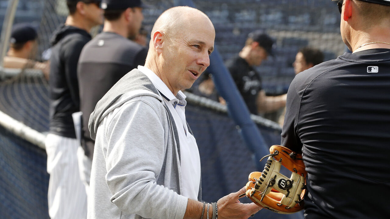 NEW YORK, NEW YORK - JUNE 20: (NEW YORK DAILIES OUT) New York Yankees general manager Brian Cashman looks on during batting practice before a game between the Yankees and the Seattle Mariners at Yankee Stadium on June 20, 2023 in the Bronx borough of New York City. The Yankees defeated the Mariners 3-1.