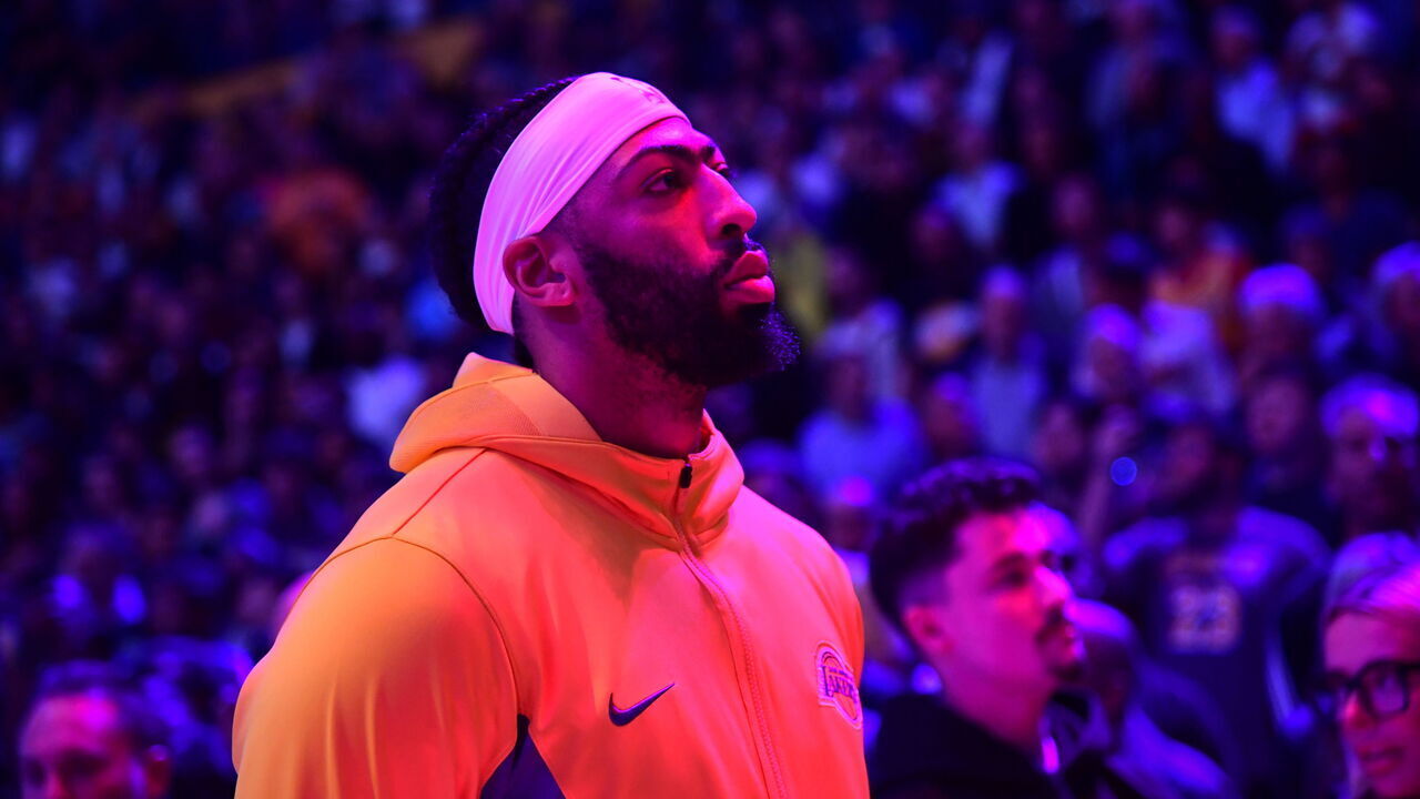 LOS ANGELES, CA - NOVEMBER 22: Anthony Davis #3 of the Los Angeles Lakers stands for the National Anthem before the game against the Dallas Mavericks on November 22, 2023 at Crypto.Com Arena in Los Angeles, California. NOTE TO USER: User expressly acknowledges and agrees that, by downloading and/or using this Photograph, user is consenting to the terms and conditions of the Getty Images License Agreement. Mandatory Copyright Notice: Copyright 2023 NBAE
