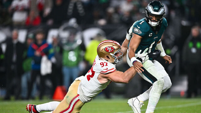 PHILADELPHIA, PA - DECEMBER 03: San Francisco 49ers Defensive End Nick Bosa (97) hits Philadelphia Eagles Quarterback Jalen Hurts (1) in the second half during the game between the San Francisco 49ers and Philadelphia Eagles on December 03, 2023 at Lincoln Financial Field in Philadelphia, PA.