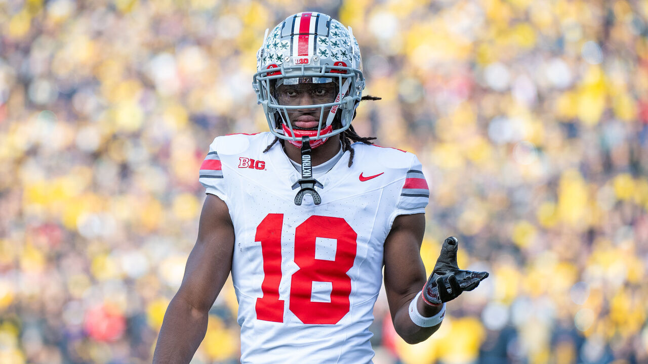 ANN ARBOR, MICHIGAN - NOVEMBER 25: Marvin Harrison Jr. #18 of the Ohio State Buckeyes walks up the field during the second half of a college football game against the Michigan Wolverines at Michigan Stadium on November 25, 2023 in Ann Arbor, Michigan. The Michigan Wolverines won the game 30-24 to win the Big Ten East.