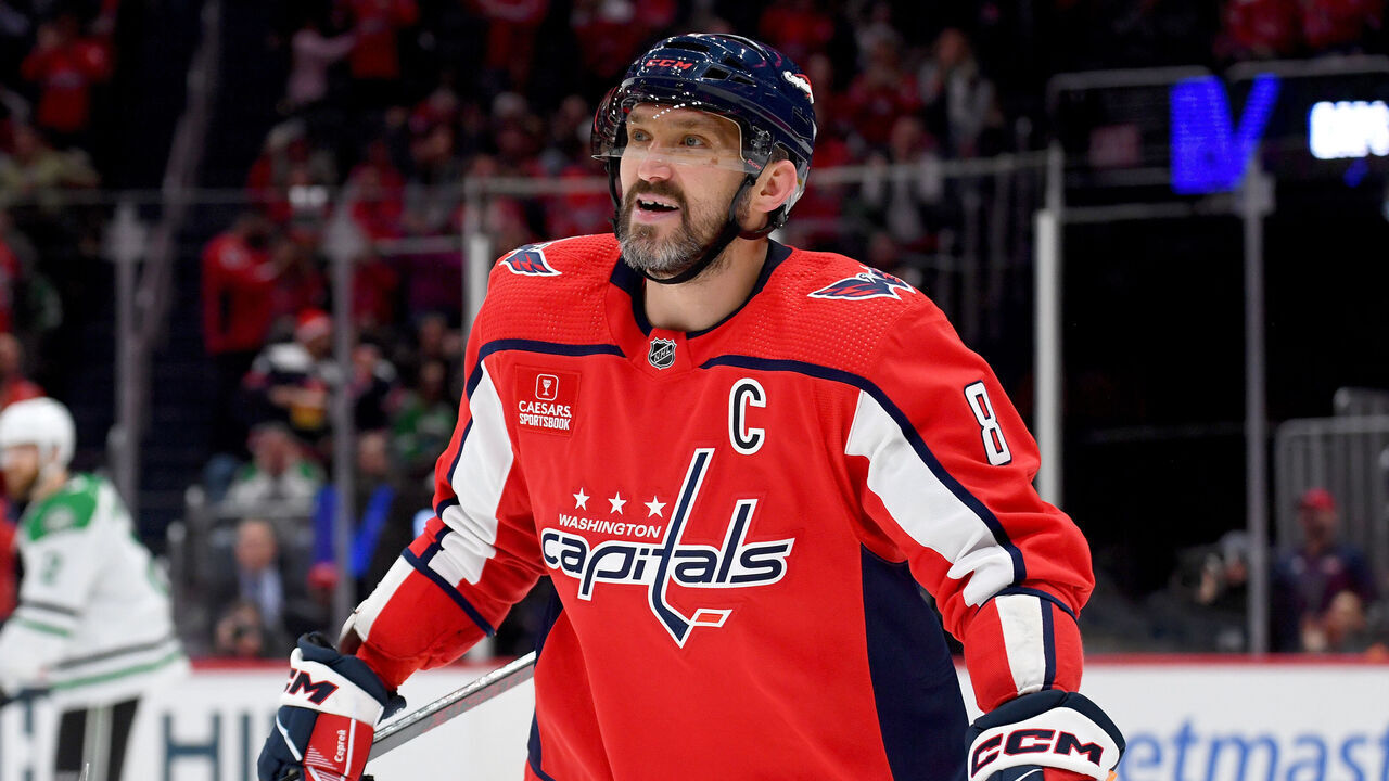 WASHINGTON, DC - DECEMBER 07: Capitals left wing Alexander Alex Ovechkin (8) smiles after his line scored a second period goal during the Dallas Stars versus Washington Capitals National Hockey League game on December 7, 2023 at Capital One Arena in Washington, D.C..