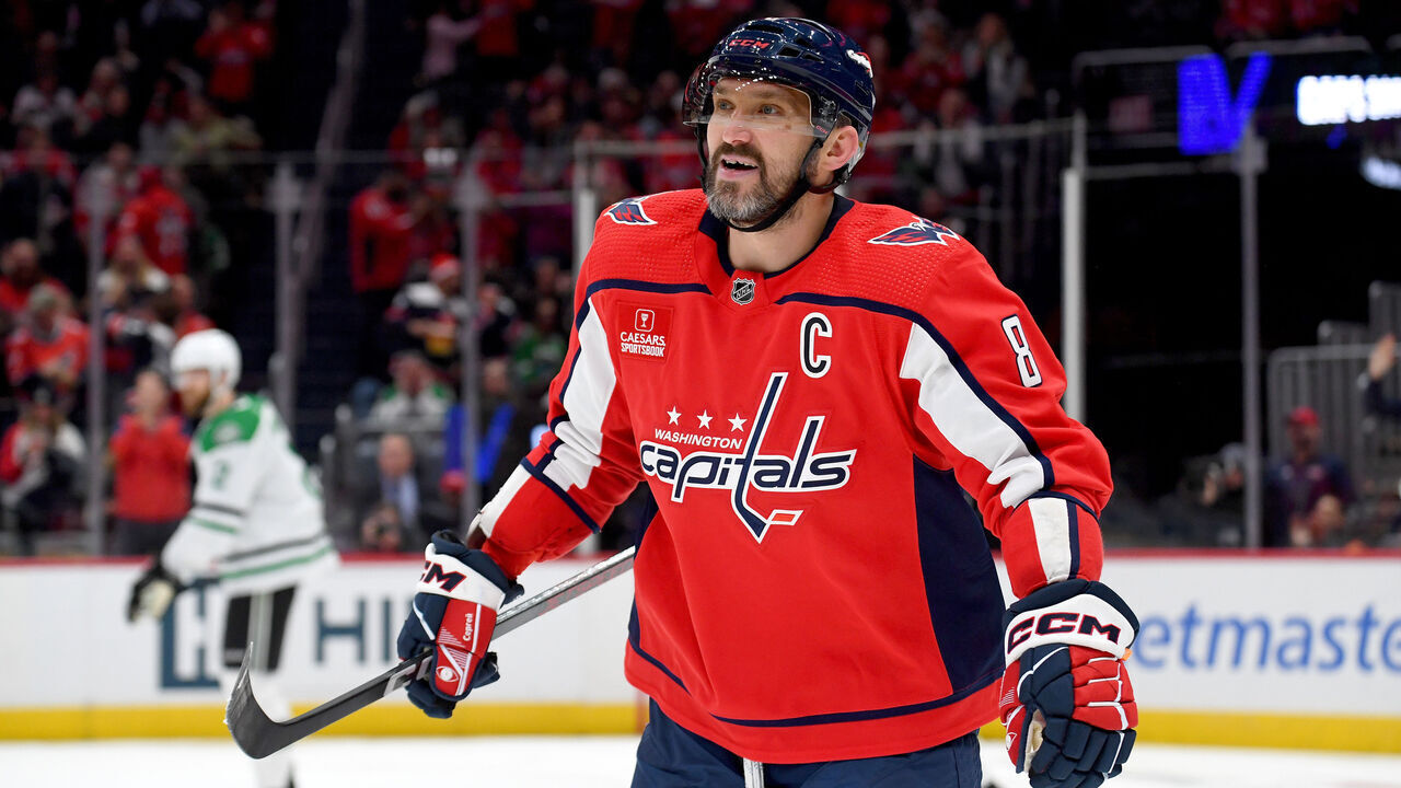 WASHINGTON, DC - DECEMBER 07: Capitals left wing Alexander Alex Ovechkin (8) smiles after his line scored a second period goal during the Dallas Stars versus Washington Capitals National Hockey League game on December 7, 2023 at Capital One Arena in Washington, D.C..