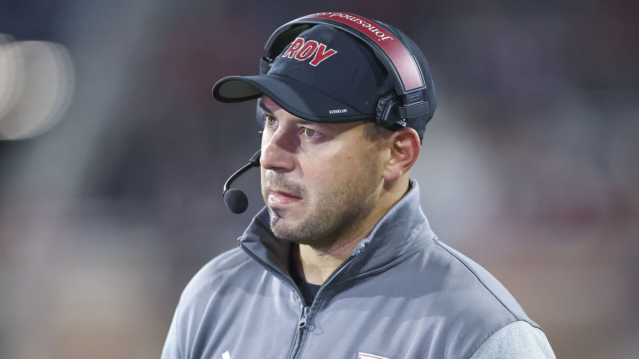 MOBILE, AL - OCTOBER 20: Troy Trojans head coach Jon Sumrall watches his offense on the field during a college football game between the Troy Trojans and the South Alabama Jaguars on October 20, 2022, at Hancock-Whitney Stadium in Mobile, Alabama.