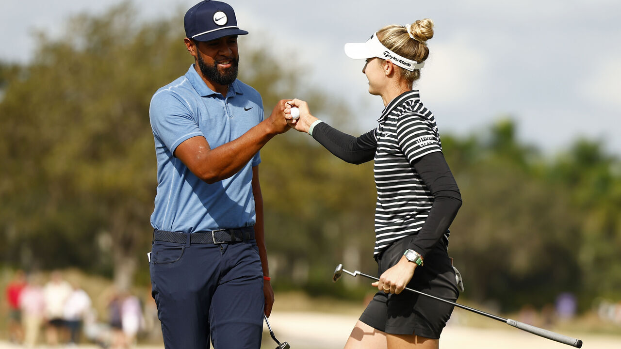 NAPLES, FLORIDA - DECEMBER 08: Tony Finau of the United States and Nelly Korda of the United States bump fists on the ninth green during the first round of the Grant Thornton Invitational at Tiburon Golf Club on December 08, 2023 in Naples, Florida.