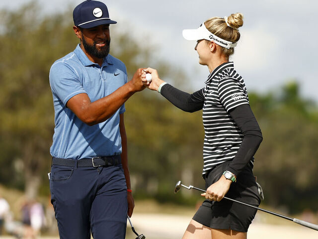 NAPLES, FLORIDA - DECEMBER 08: Tony Finau of the United States and Nelly Korda of the United States bump fists on the ninth green during the first round of the Grant Thornton Invitational at Tiburon Golf Club on December 08, 2023 in Naples, Florida.