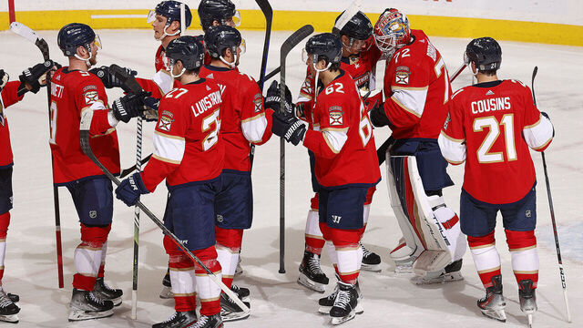 SUNRISE, FLORIDA - DECEMBER 8: The Florida Panthers celebrate their 3-1 win over the Pittsburgh Penguins at the Amerant Bank Arena on December 8, 2023 in Sunrise, Florida.