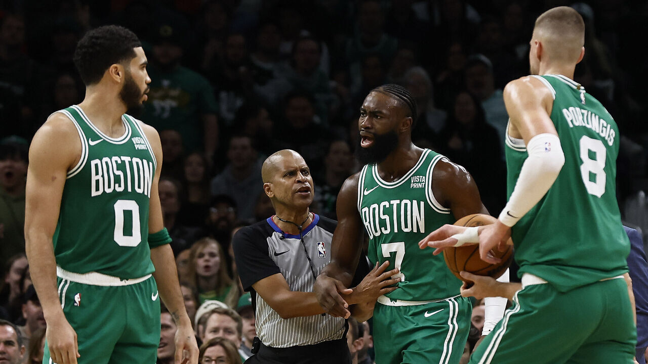 BOSTON, MA - DECEMBER 8: Jaylen Brown #7 of the Boston Celtics is held back by a referee after being ejected from the game for his second technical foul during the second half against the New York Knicks at TD Garden on December 8, 2023 in Boston, Massachusetts. NOTE TO USER: User expressly acknowledges and agrees that, by downloading and/or using this Photograph, user is consenting to the terms and conditions of the Getty Images License Agreement.