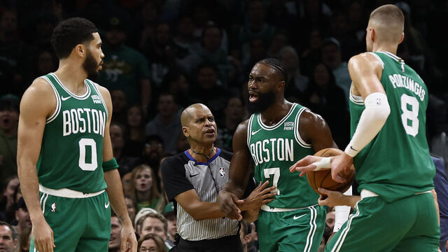BOSTON, MA - DECEMBER 8: Jaylen Brown #7 of the Boston Celtics is held back by a referee after being ejected from the game for his second technical foul during the second half against the New York Knicks at TD Garden on December 8, 2023 in Boston, Massachusetts. NOTE TO USER: User expressly acknowledges and agrees that, by downloading and/or using this Photograph, user is consenting to the terms and conditions of the Getty Images License Agreement.