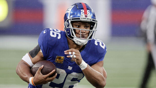 EAST RUTHERFORD, NEW JERSEY - NOVEMBER 26: (NEW YORK DAILIES OUT) Saquon Barkley #26 of the New York Giants in action against the New England Patriots at MetLife Stadium on November 26, 2023 in East Rutherford, New Jersey. The Giants defeated the Patriots 10-7.