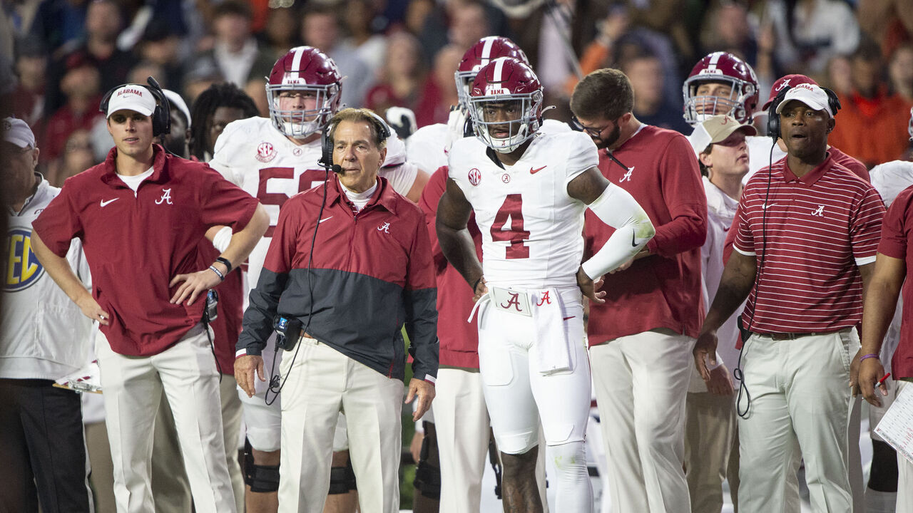 AUBURN, ALABAMA - NOVEMBER 25: Head coach Nick Saban of the Alabama Crimson Tide and quarterback Jalen Milroe #4 of the Alabama Crimson Tide during their game against the Auburn Tigers at Jordan-Hare Stadium on November 25, 2023 in Auburn, Alabama.
