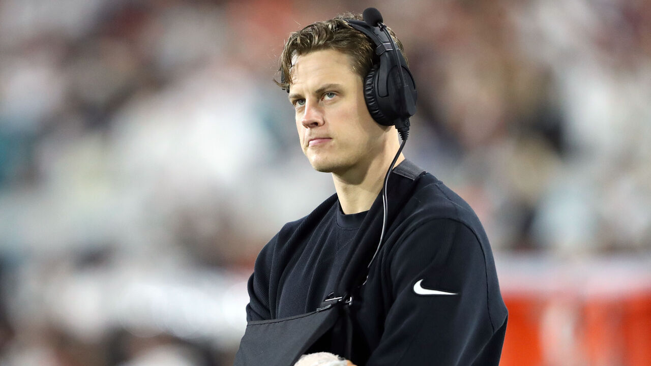 JACKSONVILLE, FLORIDA - DECEMBER 04: Joe Burrow #9 of the Cincinnati Bengals looks on from the sideline during the second half of a game against the Jacksonville Jaguars at EverBank Stadium on December 04, 2023 in Jacksonville, Florida.
