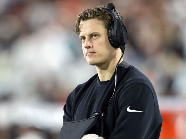 JACKSONVILLE, FLORIDA - DECEMBER 04: Joe Burrow #9 of the Cincinnati Bengals looks on from the sideline during the second half of a game against the Jacksonville Jaguars at EverBank Stadium on December 04, 2023 in Jacksonville, Florida.