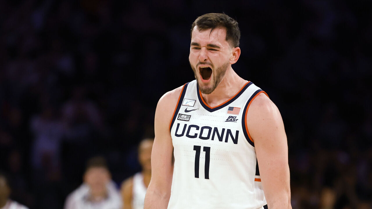 NEW YORK, NEW YORK - DECEMBER 5: Alex Karaban #11 of the Connecticut Huskies in action against the North Carolina Tar Heels during a game in the Jimmy V Classic at Madison Square Garden on December 5, 2023 in New York City. Connecticut defeated North Carolina 87-76.