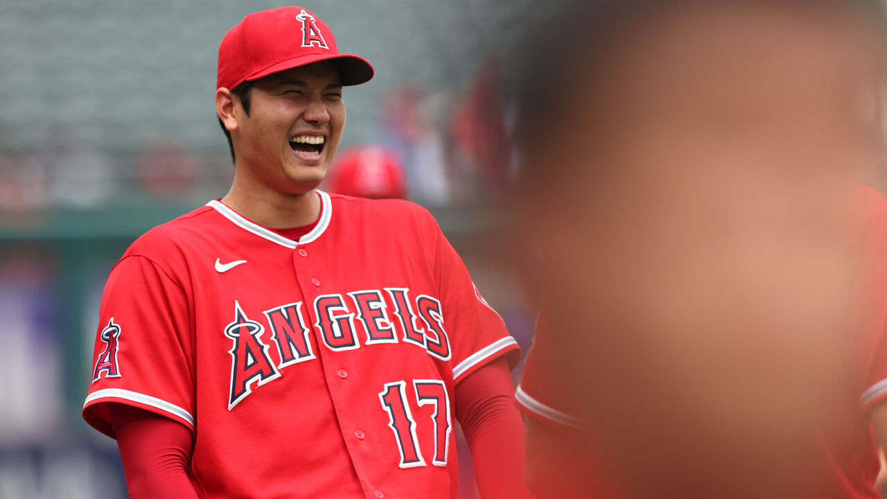 ANAHEIM, CALIFORNIA - JULY 31: Shohei Ohtani #17 laughs with Brandon Marsh #16 of the Los Angeles Angels ahead of a game against the Texas Rangers at Angel Stadium of Anaheim on July 31, 2022 in Anaheim, California.