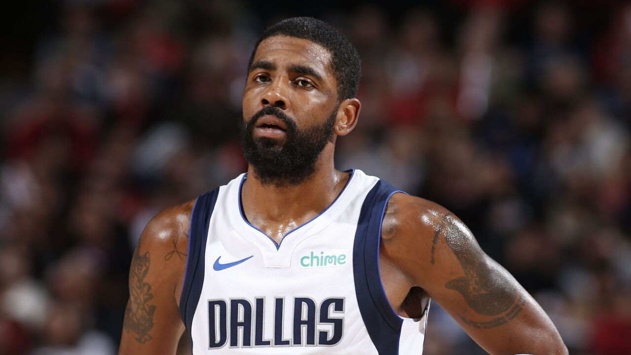PORTLAND, OR - DECEMBER 8: Kyrie Irving #11 of the Dallas Mavericks looks on during the game against the Portland Trail Blazers on December 8, 2023 at the Moda Center Arena in Portland, Oregon. Mandatory Copyright Notice: Copyright 2023 NBAE