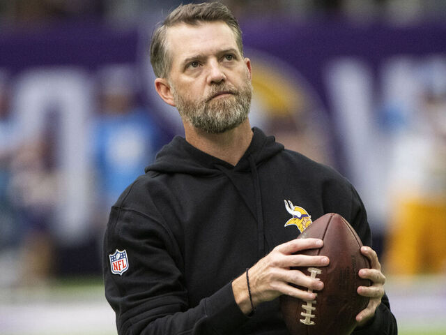 MINNEAPOLIS, MINNESOTA - SEPTEMBER 24: Minnesota Vikings offensive coordinator Wes Phillips throws a ball on the field before the game against the Los Angeles Chargers at U.S. Bank Stadium on September 24, 2023 in Minneapolis, Minnesota.