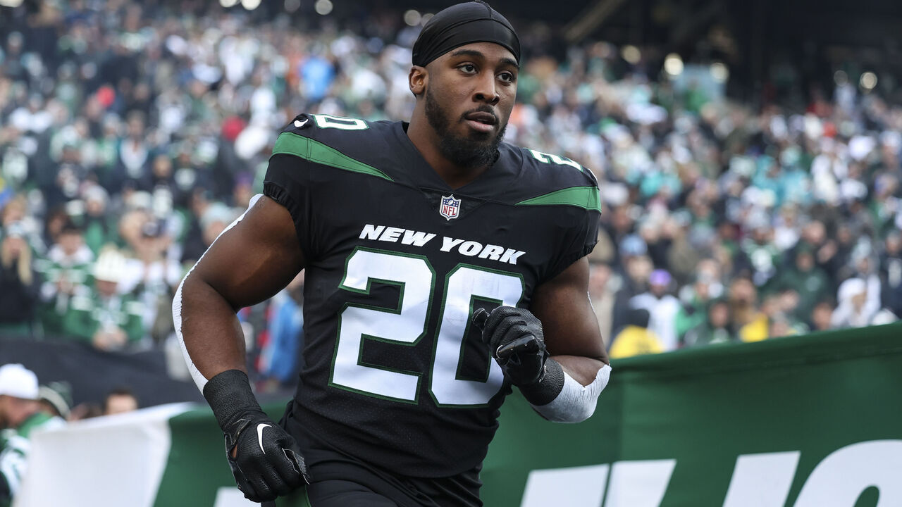 EAST RUTHERFORD, NJ - NOVEMBER 24: Breece Hall #20 of the New York Jets runs out of the tunnel prior to an NFL football game against the Miami Dolphins at MetLife Stadium on November 24, 2023 in East Rutherford, New Jersey.