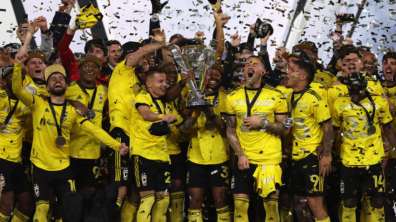 COLUMBUS, OHIO - DECEMBER 09: The Columbus Crew hold up the Philip F. Anschutz Trophy after winning the 2023 MLS Cup against the Los Angeles FC at Lower.com Field on December 09, 2023 in Columbus, Ohio.