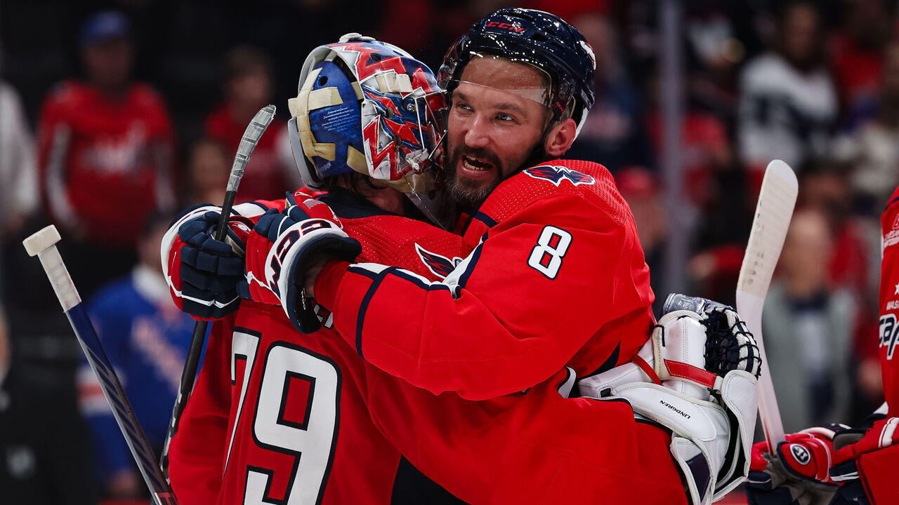 WASHINGTON, DC - DECEMBER 09: Charlie Lindgren #79 and Alex Ovechkin #8 of the Washington Capitals celebrate after the game against the New York Rangers at Capital One Arena on December 9, 2023 in Washington, DC.
