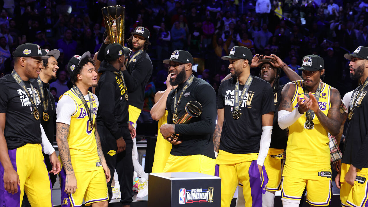 LAS VEGAS, NV - DECEMBER 9: LeBron James #23 of the Los Angeles Lakers celebrates with the In-Season Tournament MVP trophy after winning the In-Season Tournament Championship game against the Indiana Pacers on December 9, 2023 at T-Mobile Arena in Las Vegas, Nevada. Mandatory Copyright Notice: Copyright 2023 NBAE